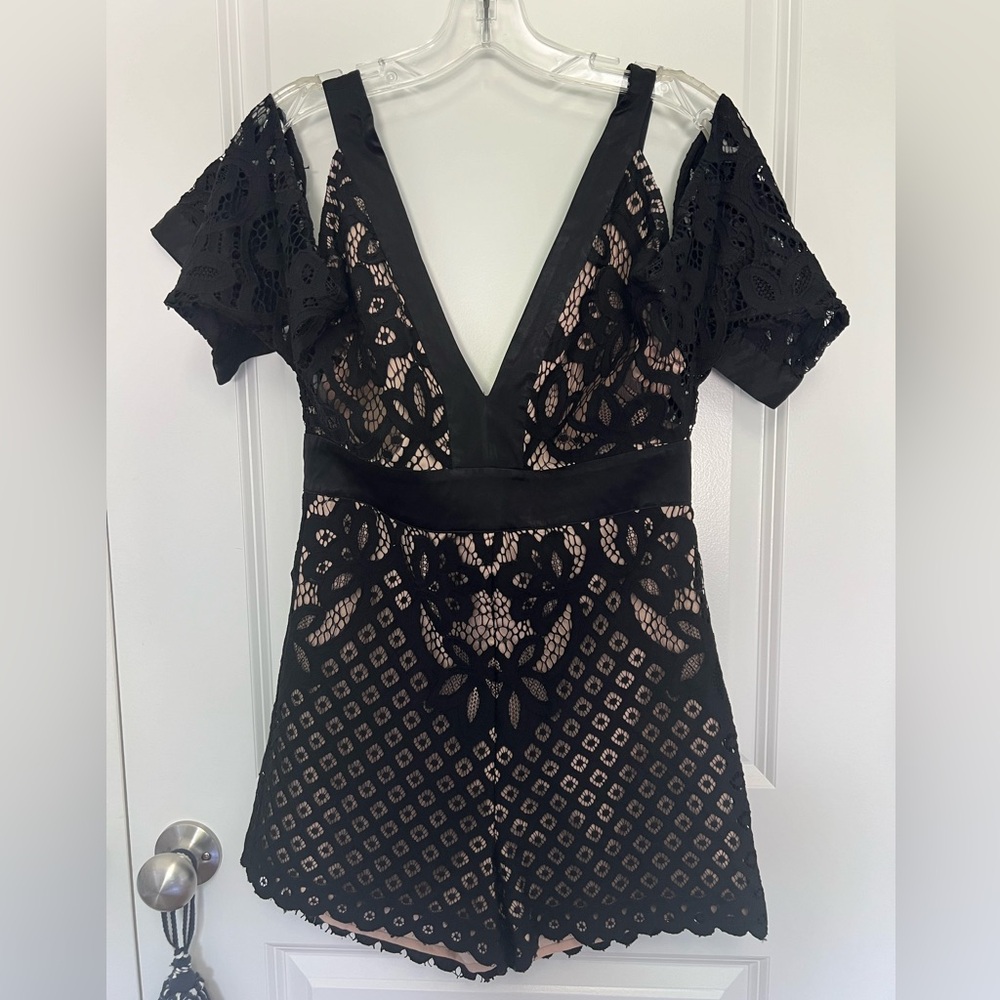 Black lace romper. Size 6